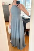 Extremely flattering, loose material that still creates a nice silhouette. The back is just perfect! Long enough for me (5'8") to wear 2-3" heels. - Lauren I.