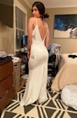 The dress is amazing and fit perfectly, good quality, good purchase is great, I really recommend it. - Ginna R.