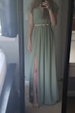 I bought this sage green dress to wear for a spring wedding. It's ABSOLUTELY BEAUTIFUL. It fits my body perfectly! Although it is a little long on me (I'm 5'6), it's nothing that 3 inch heels couldn't fix. In my opinion, this is the perfect medium to dress up or dress down by accessorizing! - Kristin D.