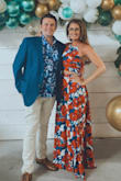 Wore this for my sisters Hawaiian themed rehearsal dinner and got so many compliments! The colors are gorgeous. Had to really steam the fabric because it wrinkles easily. Top isn't lined and fabric is thin but nothing see through. Wore pasties. I got my normal size (medium) and the skirt was just a little big but still worked. I am 5'9 and even in 3 inch heels this was still a little long so plan on having to hem the bottom if you are shorter. - Mandy M.