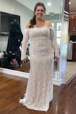 The dress fit really nice on my curves and the detail at the end of the sleeve was very elegant. But the lace on the neckline wasn't as elegant as I'd like for my wedding dress. - Jannel P.