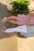 These feel snug and comfy on my foot. The nude color balances the chunky braided straps. - Kelley S.