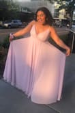 This dress was so pretty! The material was really nice and it has a satiny slip underneath so it is not see through. For me it was a little long, even with my three inch heels, but otherwise it was a wonderful fit. I sized up (for extra room), but if you want a tighter fit, order true to size. Everyone was complimenting me and saying that the dress works well with my complexion. I would def recommend to anyone looking for a prom/formal dress! - Sriya G.