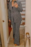 I like this blouse. It is a little short but with high waisted pants it works to tuck in. It's comfy and works well for under my suit. - Becca H.