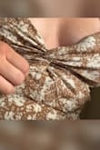I wanted to love this dress but I had to return it. The fit was just not flattering. Under my breasts was a seam that made it look like I had an extra roll of fat. The back was pretty but I returned it. - Jennifer D.