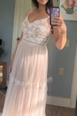 I love this dress! It is super light and girlie and instantly made me feel pretty. The light can make it look pink or cream and I actually love that about this dress. I can usually wear a small or medium from Lulus but I don't think I would have been able to zipper up the small on me; the medium was perfect ! With a pair of heals it the dress sits above the floor so no hem required for me. - Brooke F.