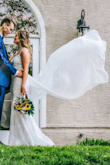 I received too many compliments to count on this dress at my wedding! It was so simple, and the little train came out great in photos! I did not get any alterations done because it really didn't need any. It felt perfect and made me feel so beautiful on my day. - Loretta Y.