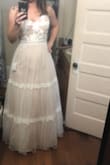 This dress is stunning! I wore it for my elopement when "my dress" did not come in time. Honestly I am so happy it didn't! This was perfect!
I disagree with others who felt it wasn't bridal enough. I got so many compliments! We did a lake elopement and a dinner cruise and everyone raves about this dress. It's light and comfortable but just chic. - Somaerah K.