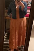 This dress is more casual than I expected, its made with a softer kind of stretchy fabric. Still very cute and looks great with a jean jacket! In this pic it is straight out of the bag and definitely needs to be ironed LOL - Cara E.