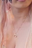 Decent quality, and lots of rings to choose different lengths. Exactly what was expected with price. Does get twisted around each other when wearing it but not sure how that can be avoided - Lexi T.