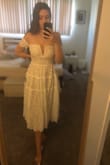 I was so excited when this dress came back in stock and ordered that day! When it came I put it on right away and loved it, it was exactly what I wanted.. BUT the other reviews are right, it is big and I am definitely going to need to get it taken in/altered. I almost ordered a S actually but decided to size down and thank gosh I did because it runs big. Excuse me awkwardly holding the back of the dress in the photos, otherwise it looks too big. The zipper also keeps getting stuck but that happens with all Lulus dress. It's a beautiful dress and great material that I'm super excited to wear but definitely size down is the most important thing - Bri A.