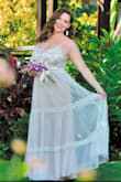 I cannot believe I found a wedding dress for this price that looked and fit like this did.  Quality was excellent.  My friend's jaw dropped- she said it looked like couture.  Another friend said the pics could be in a bridal magazine.  I would order again from this company without hesitation. - Kelly B.