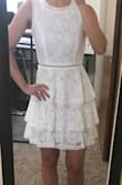 I have a small upper body, bigger hips, and a booty. The small fit perfectly. I ordered the medium first, but it was way too big up top, so I sent it back. It's a really flattering dress. - Mary N.
