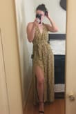 This dress is perfect! I bought it for a wedding, and it's the perfect mix of sexy and modest. The slit is not too high, so it doesn't open up when I'm walking, but I can show off my leg in pics if I want! The length is perfect for me, although I am tall so it may be long for some. I love that the straps are adjustable so it's easy to make it fit snug around the bust, and the back is super cute. That being said, I'm still gonna use some fashion tape for added security just to make sure I don't flash anyone when leaning over. - Anna D.