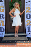 This dress has thick fabric and is made extremely well. It also has a slight stretch do it fits like a glove on top and stays slightly flared on the bottom which creates great lines and an amazing fit. I highly recommend this amazing dress!! - Carmon C.