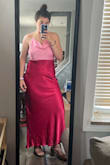I think the dress fits wonderfully. You can adjust the straps if you want a more secure bust (if you don't want to wear a bra). Not tight around the hips! I look forward to wearing this for my best friends summer wedding - Samantha S.