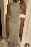The style of this dress is amazing and the beading is beautiful. I'm impressed at the quality for the price point. FYI - It does run more fitted than the majority of Lulus dresses (I'm a true Medium), but not too tight. - Laura S.