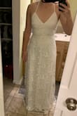 I don't think I'd even have to alter this dress - it fits so perfectly. When I wear the dress, I feel light and airy and free. The lace feels modern and I love the open back for a summer wedding. - Laura S.
