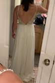 This dress is absolutely beautiful, but ended up not being my style. To me, it felt too prommy, but the fabric was beautiful and beading secure. The cups were a bit too large for my small chest, but it photographed well! One note: prepare to hem the skirt - there's a lot of material there! - Laura S.