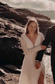 Bought this dress 2.5 weeks before my elopement. Loved the neckline and slit. The top of the dress ran slightly large for me, but I wouldn't size down. The dress looked lovely in our photos! Highly recommend. Can't beat the price! - Brielle K.