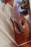 I wasn't super excited about this dress at first, just because it's not really my style. But omg this dress fits like a glove. The train is super long and beautiful, the material is heavy and sucks you in. Definitely a keeper - Alexis C.