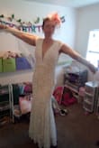I love this dress! The quality of the dress and the fabric exceeded my expectations. The lining is beige, the lace is ivory, the appliques around the neckline are white and I feel they do not match the lace on the dressing pattern either. I had already found applications to replace them with and ordered at the same time as this dress. Overall I am thrilled with this dress and I feel like a bride. These photos were taken without shapewear or a bra. I will be wearing these for my wedding I just do not own them right now. - Keeley H.