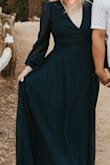 Love how comfortable and flowy this dress is! Super great quality and I love that it comes in at the waist just a little to give it some shape. Just be careful with the slit since it does run up a little high. It's also a little long but it's fine since I think most people will wear this dress with heels. - Melanie G.
