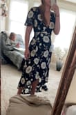 This dress shows a lot of chest (too much for what I wanted) and it took me awhile to figure out how to wrap it. 

The quality is not worth the price. - Emily O.