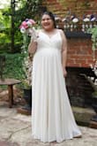I was 7 and a half months pregnant struggling to find a last minute affordable wedding dress. I tried maternity websites tried on in stores and nothing worked. I ordered this in a plus size because of my baby belly at the time a week before my wedding got here just in time! And it fit perfectly and looked beautiful. I couldn't have asked for a better dress! Highly recommend pregnant or not lol - Leilani M.
