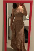 I was afraid it'd be loose on me, but you can wrap the skirt as tight as you want
I'm on the shorter side, so it was pretty long on me but still veryyyy cute. - Nazira B.