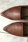 I am a true size 8. The toe was extremely tight to the point that I will not be able to emerge these or stretch them out over time. They would be good a 7 1/2. The shoes are super cute though! - Kaitlynn S.