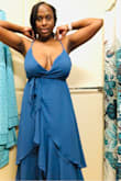 This dress is super cute! It runs slightly big, and I am heavy chested, but it was really big. The dress was big in general. - Janelle S.