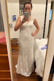 This dress feels high quality and is made of soft, stretchy material that is very comfortable. I had to get the straps shortened and the body taken in slightly, but if I had gone down a size it would have been far too tight in the butt and hips. Taller women may want to chose another dress. I'm 5'5 and with my heels on, the dress was the right length. - Emily F.