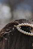 I used for my wedding day with my jumpsuit and made the look more elegant and formal. I just used one, not both at the same time, but it grabs your hair well. - Paula M.