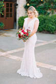 This dress was everything I imagined and more!! I wore wedges to help with the length but I didn't hem it because I liked that it gave it a train like look. I also sewed bra cups in like some others which helped a lot. I love love loved this dress and the pics speak for themselves!! - Emily B.