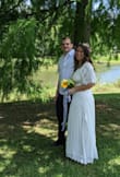 I have gained a LOT of weight in the last year going through IVF. I was anxious about looking as huge as I feel in our wedding pictures. I think this dress was flattering and forgiving for my figure. It feels like a much more expensive dress than it actually was. It held the girls up and in place wonderfully. (Thank goodness because I could not have fit a bra underneath). It wasn't sheer and was comfortable even in this Florida heat. I bought 5 different dresses because I was unsure what size or style would work with my new more robust figure. This was the first one I tried on and it was instant love. The dress did have a strong smell sort of like crayons when I first opened it. I hung it outside in the sunshine for a few hours and the smell was gone and the wrinkles from shipping fell right out. I was afraid to wash it for fear I'd mess it up some way before our big day. I have since washed it on cold water delicate and hung it to dry. It held up fine with no shrinking or other issues. Highly recommend! - Shannon H.