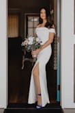 I knew I wanted a wedding dress that was simple, form-fitting, classic and inexpensive. This dress is all of those things! It felt like a custom made dress after alterations. It needed a hem and to be taken in at the middle. I needed good pantyhose to smooth everything out. I love my dress!! - Annie H.