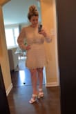 I ordered a Large, and I'm usually a Large in most things due to my chest and upper body. However, this dress runs on the bigger side and the Large felt a little baggy in the waist area, and the sleeves/shoulders. I ended up returning, because I needed a Medium and didn't love it for the event I was trying to wear it for. The color is more cream, almost a tan color, and I was wanting a brighter cream/white for my wedding rehearsal. - Jenna M.