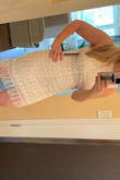 I am usually a large in most dresses, but after reading reviews I ordered the medium in this one and so glad I did! It fits like a glove! The fringe detail on bottom and the eyelet cutouts around the rib area are so cute! I will be wearing this dress for my wedding rehearsal. Super flattering! - Jenna M.