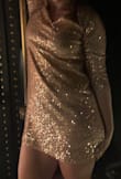 Perfect dress for going out. Fits true to size and it very flattering. Love the quarter length sleeve for cool nights. The sequins tend to catch on each other and pull. - Bailie D.