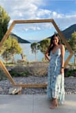 I loved this dress! I got so many compliments in the wedding I went to, so it was a good choice in color and style. The only thing It is very open on the front you just need to tie up until you feel comfortable with yourself. Keep that on mind. - Laura C.