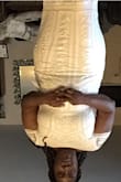 This dress is beautiful but unfortunately I had to return because XL is the largest size and it runs pretty small. The dress isn't giving. Very fitted! The XL was just too tight around the arms and back. I'm very curvy as well. Probably works best for non curvy girls. - Marie J.