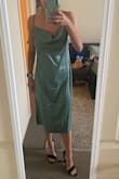 I LOVED this dress, but unfortunately had to return it because it was too large on me. I usually order a small or medium in clothes but the small was even too big! 
I really wanted to keep it, but the waist was just too boxy because it was too big on me. - Jenna W.