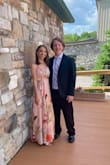 This dress is absolutely gorgeous. The material is light and flowy, perfect for a summer wedding. The adjustable straps helped because the top was just a little large. I had to get the dress shortened since I am only 5'1", but after doing so, it fits great! - Marisa C.