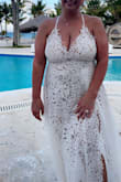 Perfect Beach wedding dress, I'm so happy with it! I did have to take the straps in about an inch on both sides for more support but sewed it myself.
XL - Michelle C.