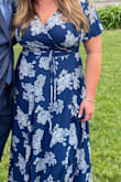 I love this dress and received so many compliments. I'm curvy and large chested and this dress flattered my body type. I wore it to a wedding on a day it was 96 degrees out and wasn't too hot in it. I used body tape around the chest area and on the sleeves to keep them closed and it worked well. I have bought this dress in three colors and plan on wearing on casual weddings as well as black tie events. - Bridget F.