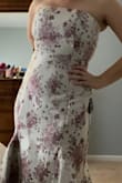 It's the same dress as the picture, the fabric is beautiful and shines a bit. - Maria D.