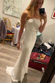 Absolutely beautiful dress. Loved it. I ordered 2 sizes because I was slightly between and I ended up keeping the larger one. There is not much give/stretch around hips so if you are between two sizes, I recommend going up! (You can always take it in if needed!) - Aly M.