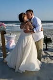My 20 year vow renewal on the beach in this dress was a dream come true. I ordered an XL but had to size up for my bra band area. I usually wear a size 12 jeans, 38DD and a L shirt. This dress was flowing in the wind, it was magical in pictures. Buy it! The Ivory was beautiful. - Natalie B.
