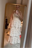 This dress is beautiful! So elegant, looks just like the picture. Only thing is that the chest area doesn't have any support, I wish it had some built in padding. - Ruth F.